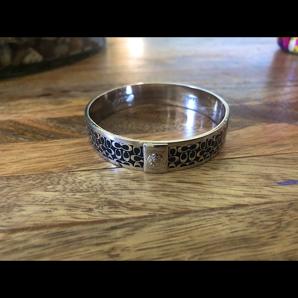Authentic Black and sterling silver coach bangle